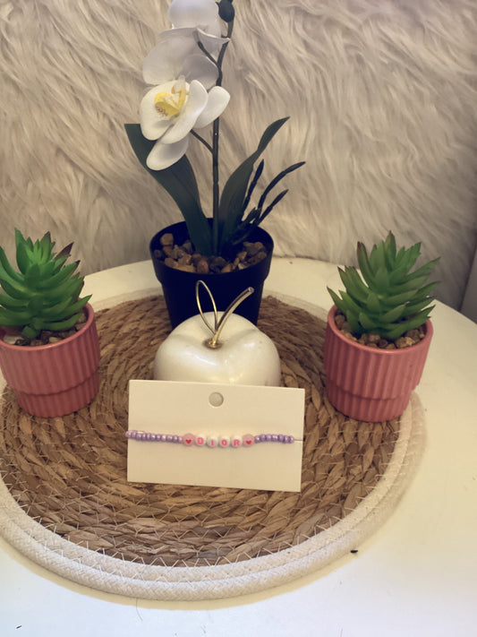 Bracelet petites perles marquer DIOR parme
